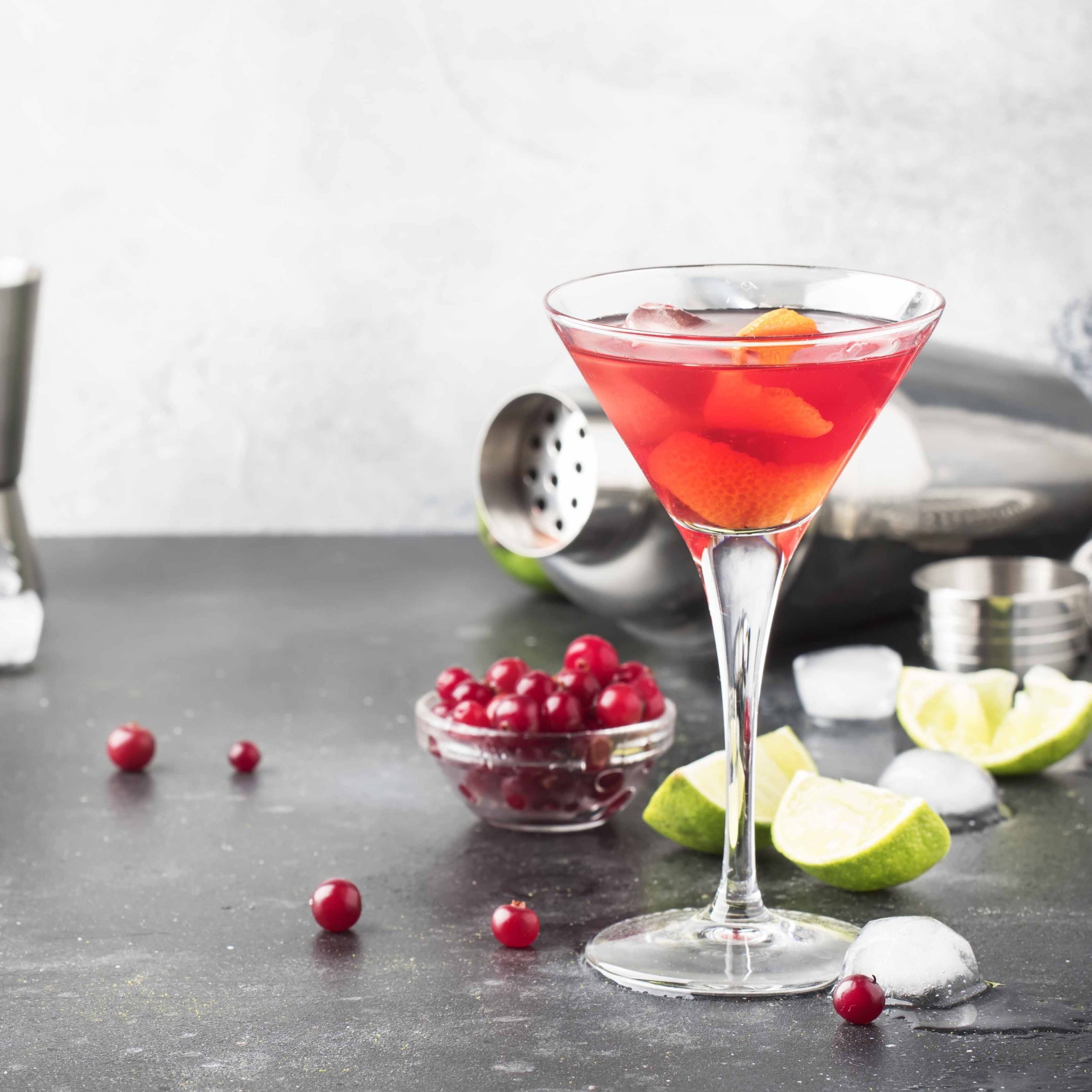 Classic alcoholic cocktail cosmopolitan with vodka, liqueur, cra