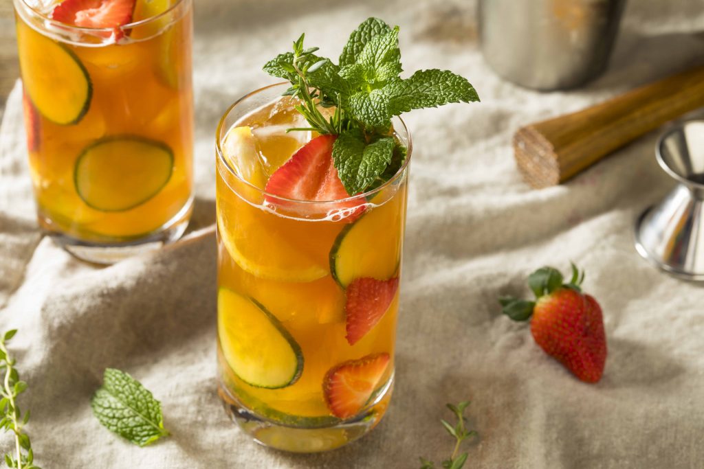 Sweet Refreshing Pimms Cup Cocktail with Fruit and Mint